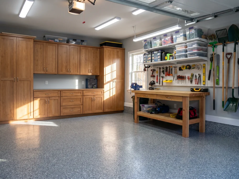 Garage with custom cabinet storage system and workbench