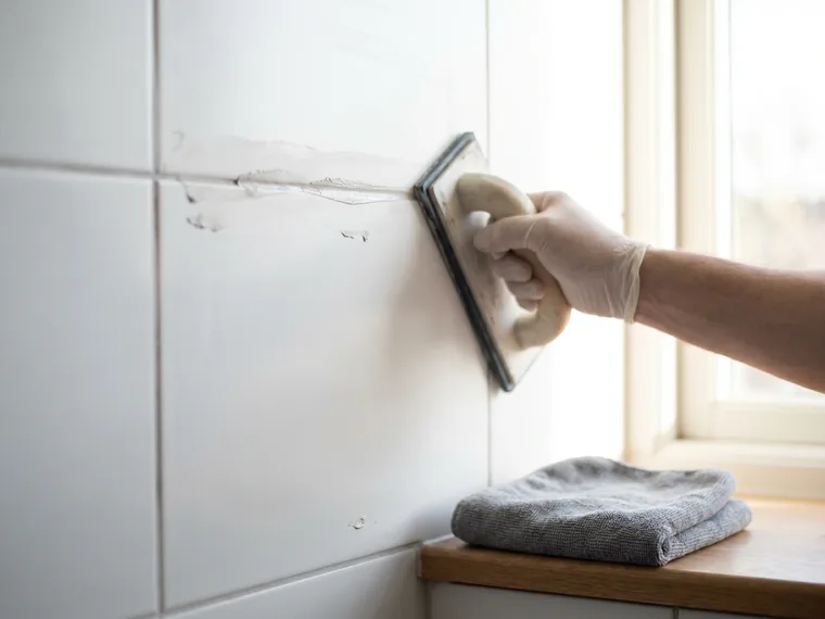 Grouting a tiled shower wall