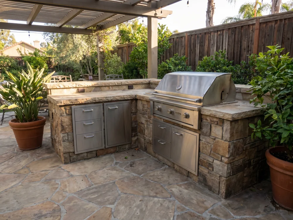 Outdoor kitchen with weather-resistant cabinetry